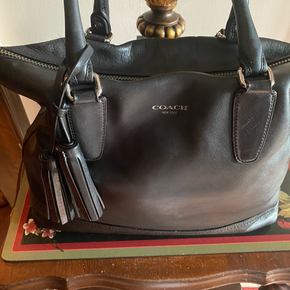 A classic black authentic coach bag
